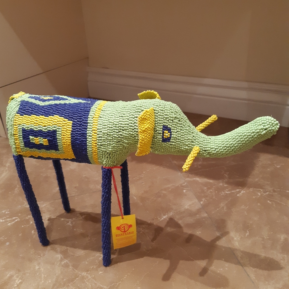 Monkeybiz handmade beaded elephant. Blue yellow green